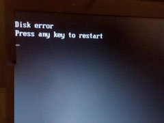 Win7开机显示＂press any key to restart＂怎么办？