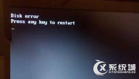 Win7开机显示＂press any key to restart＂怎么办？